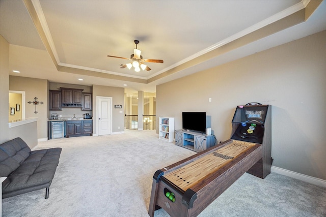 2011 Greenvine Cir, Katy, TX 77494 - living area with a raised ceiling, light colored carpet, crown molding, baseboards, and ceiling fan