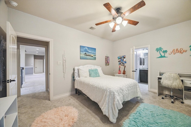 2011 Greenvine Cir, Katy, TX 77494 - bedroom with light carpet, baseboards, a ceiling fan, and connected bathroom