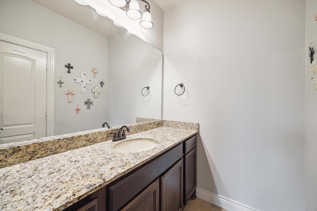 2011 Greenvine Cir, Katy, TX 77494 - bathroom with vanity, baseboards, and tile patterned floors