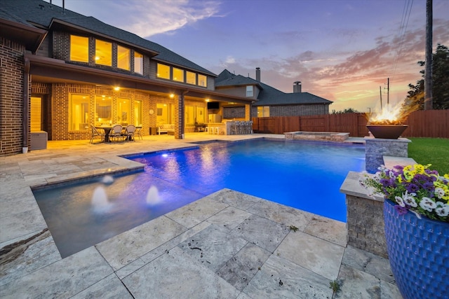 2011 Greenvine Cir, Katy, TX 77494 - view of swimming pool with a fenced backyard, an in-ground hot tub, and a patio