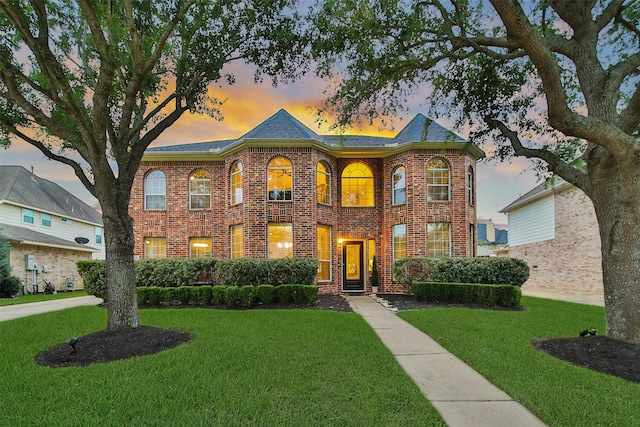 27115 Meadow Sage Ct, Cypress, TX 77433 - colonial inspired home featuring a lawn and brick siding