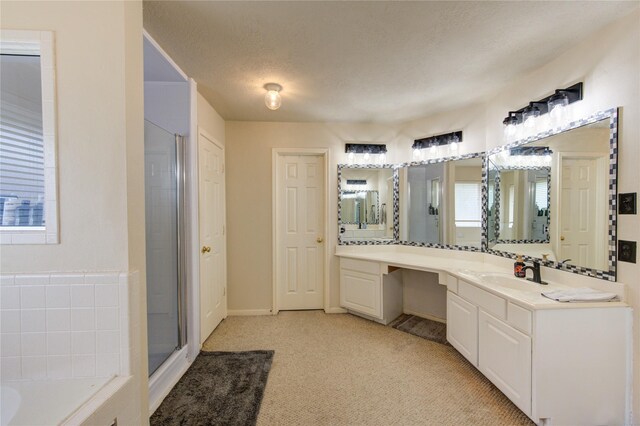 1635 Pebble Banks, Pasadena, TX 77586 - full bathroom with vanity, a stall shower, a bath, and plenty of natural light