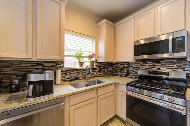 1635 Pebble Banks, Pasadena, TX 77586 - kitchen with appliances with stainless steel finishes, a sink, and tasteful backsplash