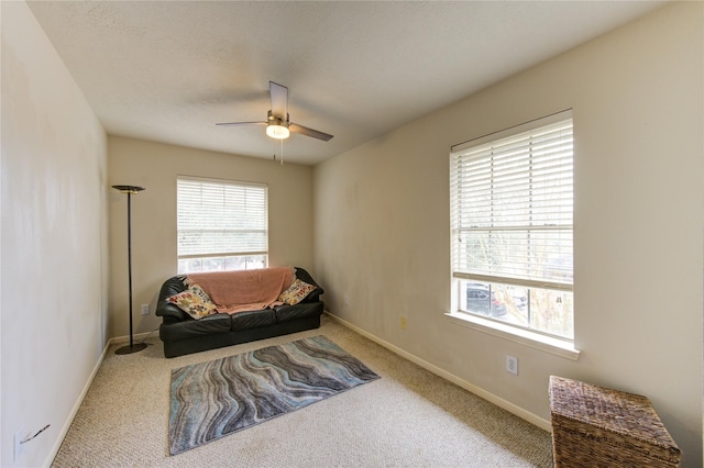 1635 Pebble Banks, Pasadena, TX 77586 - living area with ceiling fan, carpet, and baseboards