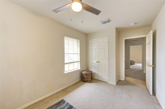 1635 Pebble Banks, Pasadena, TX 77586 - unfurnished bedroom with light carpet, baseboards, a closet, and ceiling fan