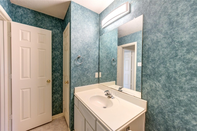 1635 Pebble Banks, Pasadena, TX 77586 - bathroom featuring vanity and tile patterned floors