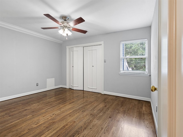 3307 Chris Dr, Houston, TX 77063 - unfurnished bedroom with dark wood finished floors, baseboards, a closet, ceiling fan, and ornamental molding