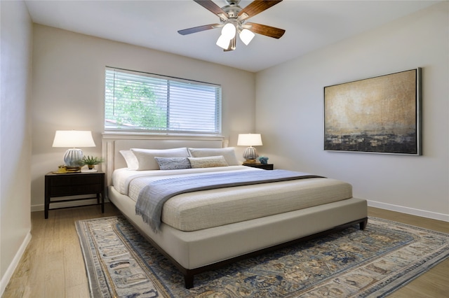 5810 Verdome Ln, Houston, TX 77092 - bedroom with wood finished floors, baseboards, and ceiling fan
