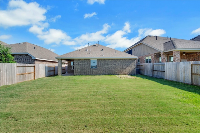 19219 S Cottonwood Green Ln, Cypress, TX 77433 - rear view of house with roof with shingles and brick siding