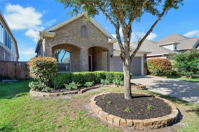 19219 S Cottonwood Green Ln, Cypress, TX 77433 - view of front facade with brick siding, an attached garage, and driveway