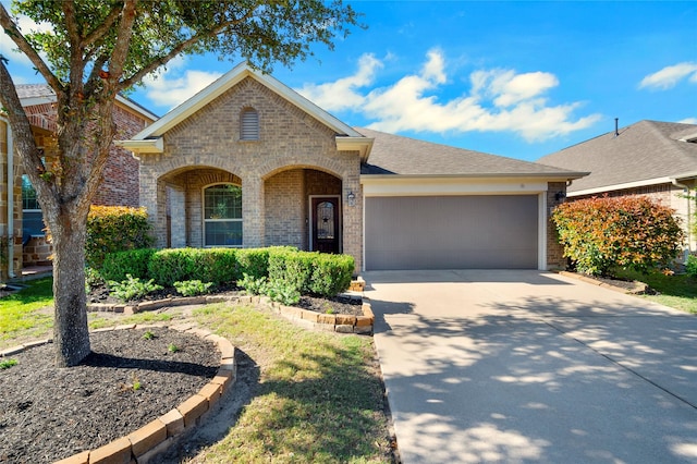 19219 S Cottonwood Green Ln, Cypress, TX 77433 - view of front facade featuring brick siding, an attached garage, and driveway