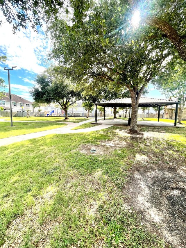 13150 Lawsons Creek Ln, Houston, TX 77072 - view of grassy yard featuring a carport