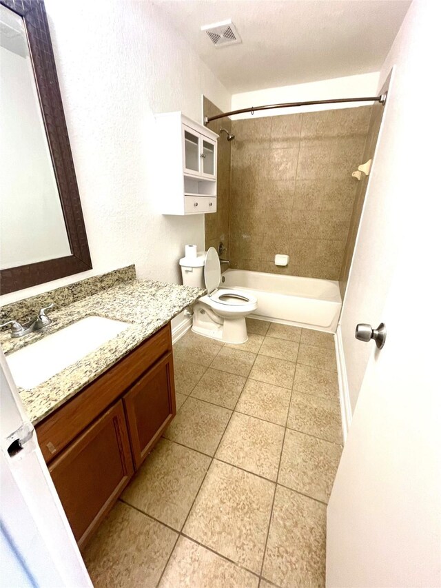 13150 Lawsons Creek Ln, Houston, TX 77072 - full bathroom with tile patterned floors, toilet, vanity, shower / tub combination, and baseboards