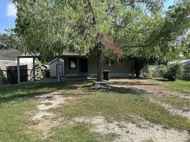3418 Memel St, Houston, TX 77026 - view of yard featuring a storage unit and an outdoor structure