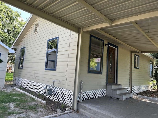 3418 Memel St, Houston, TX 77026 - view of side of property with entry steps and crawl space