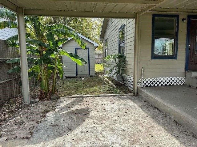 3418 Memel St, Houston, TX 77026 - view of patio / terrace with a storage shed, an outbuilding, and fence