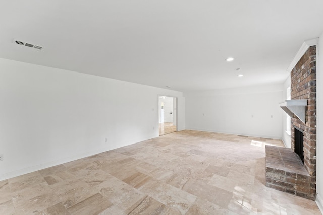 3310 Riviera Ln, Houston, TX 77338 - unfurnished living room featuring a fireplace, stone finish flooring, recessed lighting, and baseboards