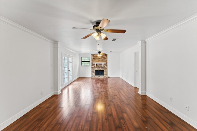 3310 Riviera Ln, Houston, TX 77338 - unfurnished living room featuring a ceiling fan, ornamental molding, a fireplace, dark wood-type flooring, and baseboards
