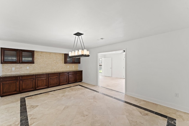 3310 Riviera Ln, Houston, TX 77338 - unfurnished dining area with inlaid floor details, baseboards, and ceiling fan