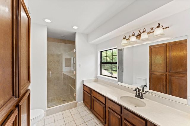 3310 Riviera Ln, Houston, TX 77338 - bathroom featuring toilet, a stall shower, tile patterned floors, recessed lighting, and vanity