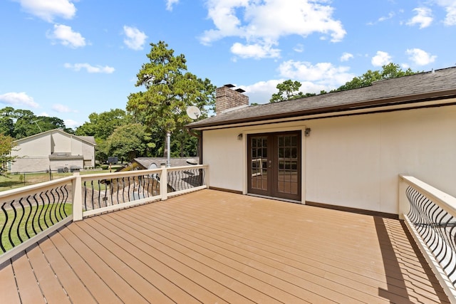 3310 Riviera Ln, Houston, TX 77338 - wooden deck with french doors and fence