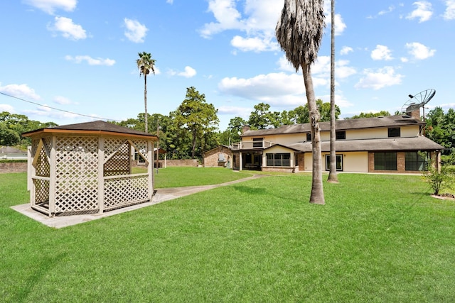 3310 Riviera Ln, Houston, TX 77338 - view of green lawn featuring a gazebo