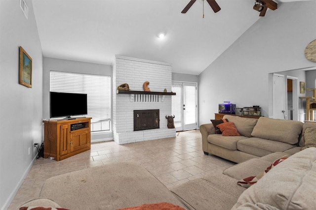 445 Augusta Dr, Huntsville, TX 77340 - living area with ceiling fan, baseboards, a brick fireplace, beamed ceiling, and high vaulted ceiling