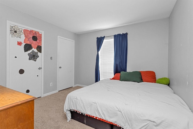 445 Augusta Dr, Huntsville, TX 77340 - carpeted bedroom with baseboards