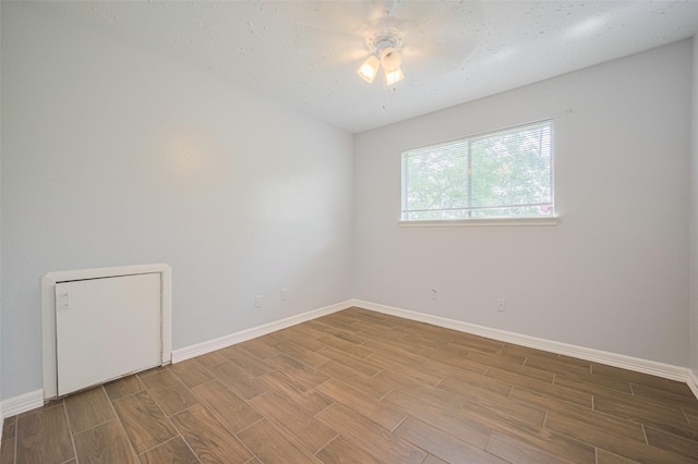 20101 Dawn Mist Dr, Humble, TX 77346 - spare room featuring wood finish floors, baseboards, and ceiling fan