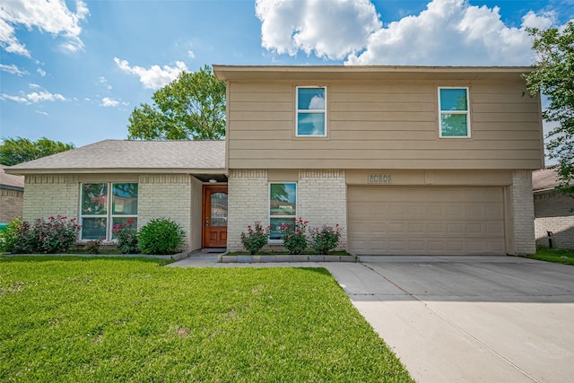 20101 Dawn Mist Dr, Humble, TX 77346 - colonial home with brick siding, an attached garage, concrete driveway, and a front yard