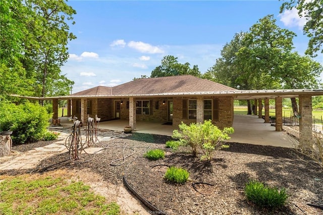 6448 Hwy 30, Anderson, TX 77830 - back of property with a patio and brick siding