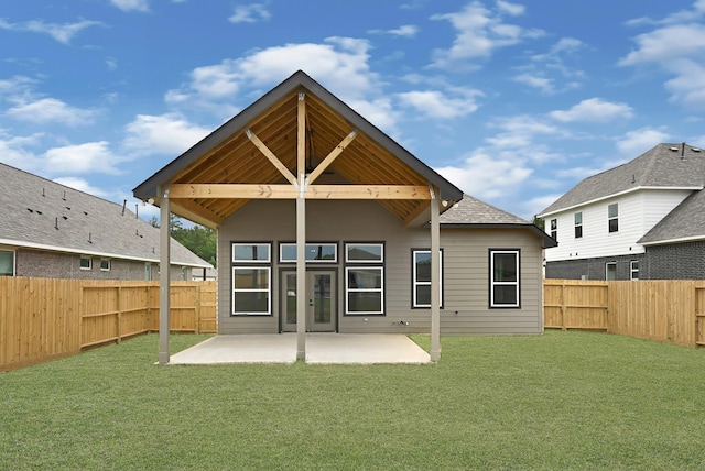 318 Little Spring Ct, Anahuac, TX 77523 - back of house with a patio
