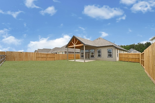 318 Little Spring Ct, Anahuac, TX 77523 - back of house featuring a patio area