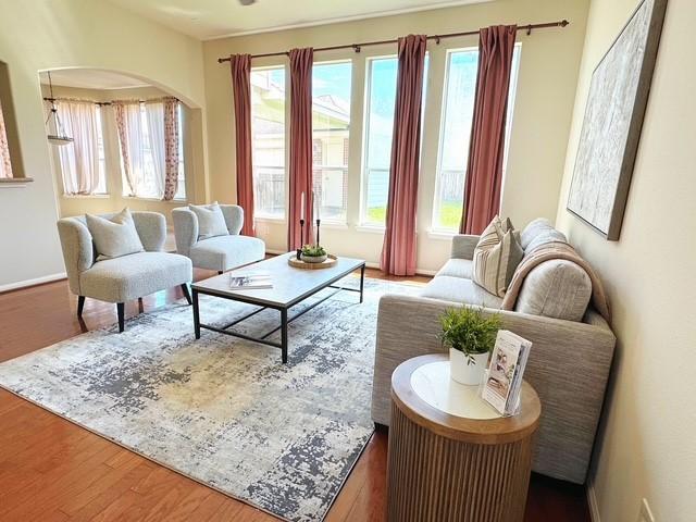 11510 Misty Arch Ln, Cypress, TX 77433 - living room with wood finished floors and baseboards