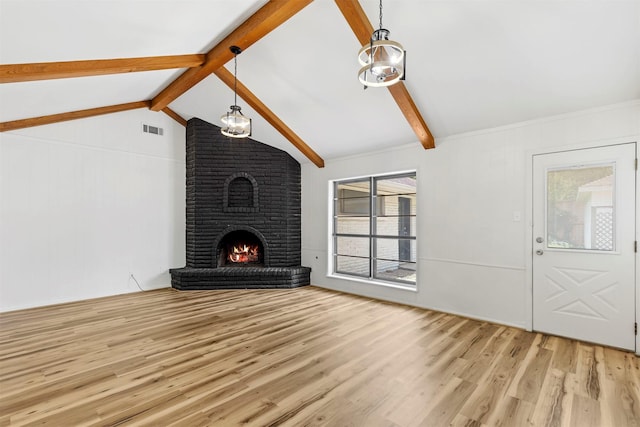 2407 Del Norte St, Houston, TX 77018 - unfurnished living room featuring a chandelier, light wood finished floors, and a fireplace