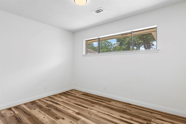 2407 Del Norte St, Houston, TX 77018 - spare room with wood finished floors and baseboards