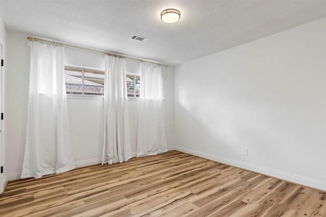 2407 Del Norte St, Houston, TX 77018 - empty room with wood finished floors and baseboards
