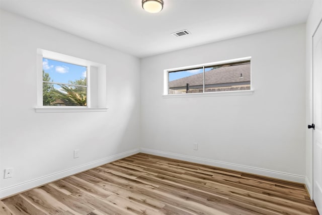 2407 Del Norte St, Houston, TX 77018 - spare room with wood finished floors and baseboards