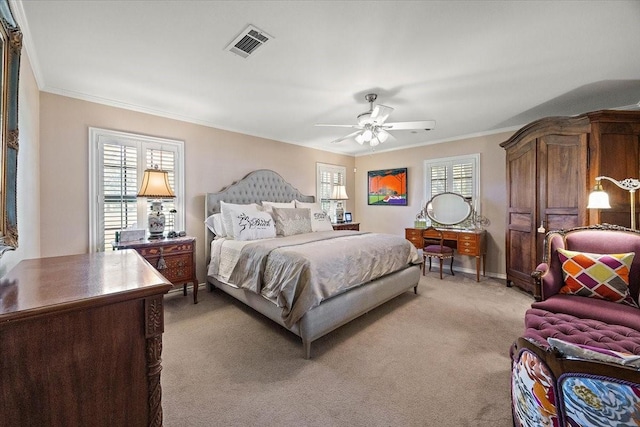 12392 Fm 355, Trinity, TX 75862 - bedroom with crown molding, light carpet, ceiling fan, and baseboards