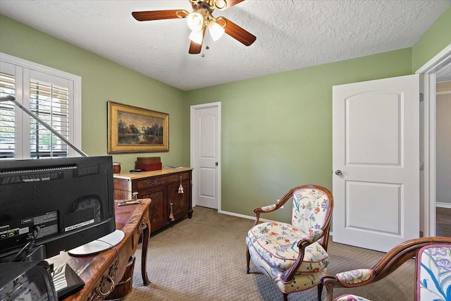 12392 Fm 355, Trinity, TX 75862 - home office with light carpet, ceiling fan, baseboards, and a textured ceiling