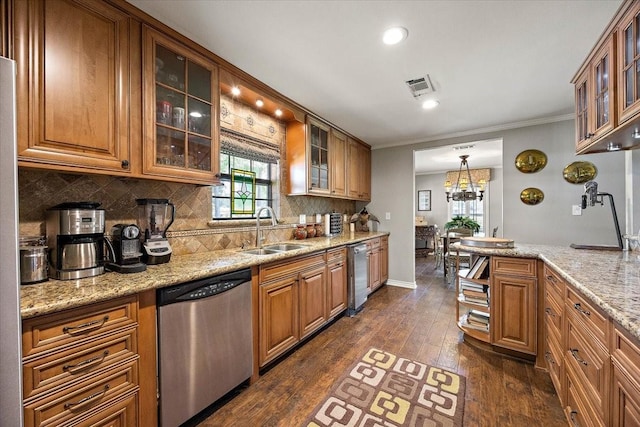 12392 Fm 355, Trinity, TX 75862 - kitchen with dishwasher, a sink, brown cabinets, dark wood-style flooring, and ornamental molding