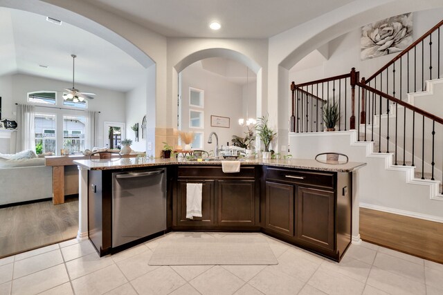 8619 Morning Dove Ln, Baytown, TX 77521 - kitchen featuring dishwasher, a ceiling fan, a sink, light stone counters, and recessed lighting