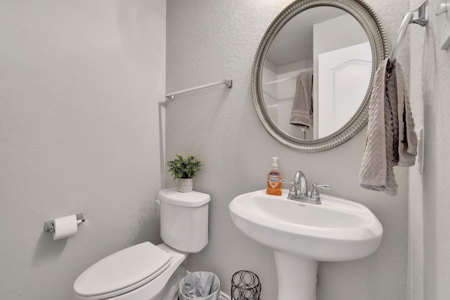 8619 Morning Dove Ln, Baytown, TX 77521 - bathroom featuring toilet and a sink