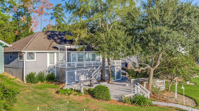 341 Sam, Houston Loop, Point Blank, TX 77364 - rear view of house with a wooden deck, a pergola, a patio, a shingled roof, and stairway