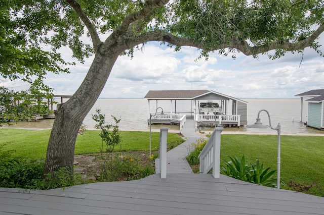 341 Sam, Houston Loop, Point Blank, TX 77364 - dock with a lawn and a water view