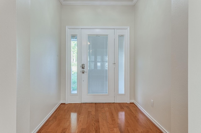 341 Sam, Houston Loop, Point Blank, TX 77364 - foyer entrance with light wood-type flooring, ornamental molding, and baseboards