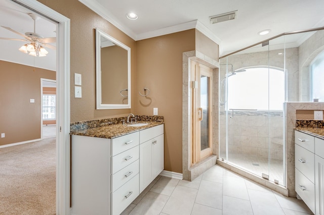341 Sam, Houston Loop, Point Blank, TX 77364 - full bathroom featuring crown molding, vanity, ceiling fan, a shower stall, and baseboards