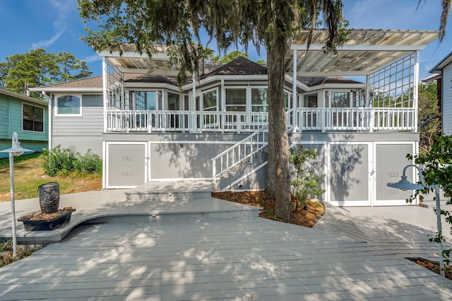 341 Sam, Houston Loop, Point Blank, TX 77364 - rear view of house featuring a wooden deck