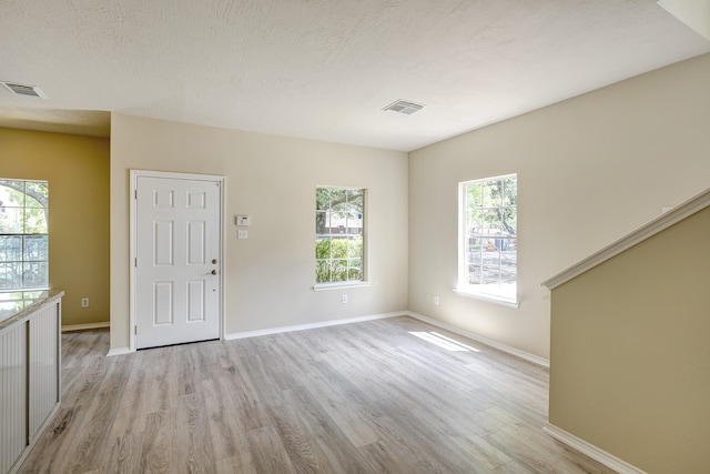 2802 Austin St, Houston, TX 77004 - foyer featuring light wood-type flooring and baseboards