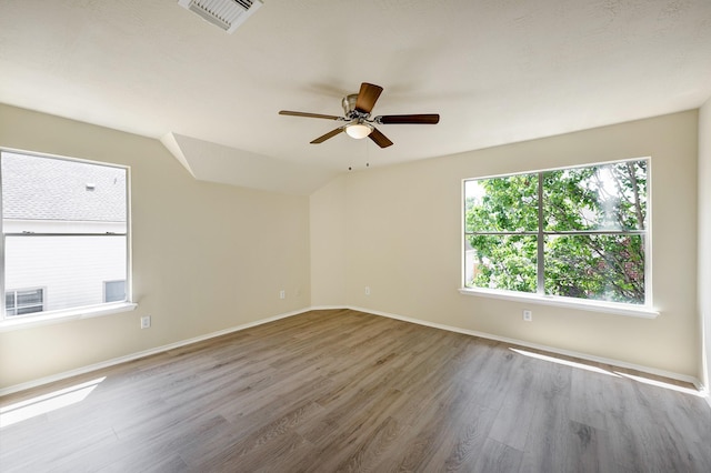 2802 Austin St, Houston, TX 77004 - empty room with wood finished floors, ceiling fan, and baseboards